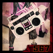 Zombified legs in pink platform heels, holding a vintage pink boombox – digital vanity, creation 567 by Cyb